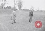 Standbild Mann und Frau mit zwei Hunden United States USA, 1948, aus Sekunde 6 historischem Filmmaterial Videoclip 65675037951