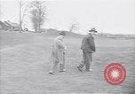 Standbild Mann und Frau mit zwei Hunden United States USA, 1948, aus Sekunde 9 historischem Filmmaterial Videoclip 65675037951