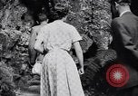 Image of Queen Elizabeth and Prince Philip visit caves New Zealand, 1954, second 15 stock footage video 65675037984