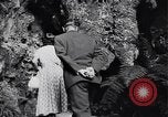 Image of Queen Elizabeth and Prince Philip visit caves New Zealand, 1954, second 18 stock footage video 65675037984