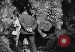 Image of Queen Elizabeth and Prince Philip visit caves New Zealand, 1954, second 19 stock footage video 65675037984