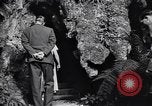 Image of Queen Elizabeth and Prince Philip visit caves New Zealand, 1954, second 20 stock footage video 65675037984