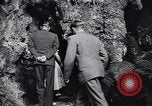 Image of Queen Elizabeth and Prince Philip visit caves New Zealand, 1954, second 21 stock footage video 65675037984