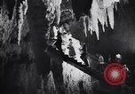 Image of Queen Elizabeth and Prince Philip visit caves New Zealand, 1954, second 25 stock footage video 65675037984