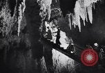 Image of Queen Elizabeth and Prince Philip visit caves New Zealand, 1954, second 28 stock footage video 65675037984