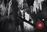 Image of Queen Elizabeth and Prince Philip visit caves New Zealand, 1954, second 29 stock footage video 65675037984