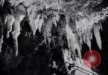 Image of Queen Elizabeth and Prince Philip visit caves New Zealand, 1954, second 36 stock footage video 65675037984