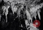 Image of Queen Elizabeth and Prince Philip visit caves New Zealand, 1954, second 37 stock footage video 65675037984