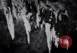 Image of Queen Elizabeth and Prince Philip visit caves New Zealand, 1954, second 52 stock footage video 65675037984