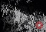 Image of Queen Elizabeth and Prince Philip visit caves New Zealand, 1954, second 56 stock footage video 65675037984