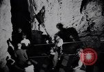 Image of Queen Elizabeth and Prince Philip visit caves New Zealand, 1954, second 59 stock footage video 65675037984