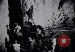 Image of Queen Elizabeth and Prince Philip visit caves New Zealand, 1954, second 60 stock footage video 65675037984