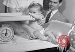 Image of dwarf family and babies Austin Texas USA, 1950, second 21 stock footage video 65675038031
