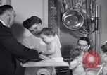 Image of dwarf family and babies Austin Texas USA, 1950, second 36 stock footage video 65675038031