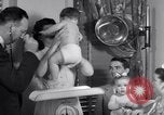 Image of dwarf family and babies Austin Texas USA, 1950, second 40 stock footage video 65675038031