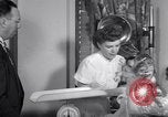 Image of dwarf family and babies Austin Texas USA, 1950, second 44 stock footage video 65675038031