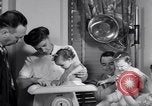 Image of dwarf family and babies Austin Texas USA, 1950, second 52 stock footage video 65675038031
