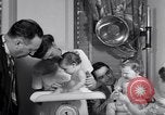 Image of dwarf family and babies Austin Texas USA, 1950, second 55 stock footage video 65675038031