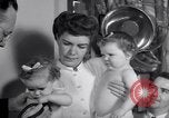 Image of dwarf family and babies Austin Texas USA, 1950, second 56 stock footage video 65675038031