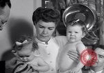 Image of dwarf family and babies Austin Texas USA, 1950, second 57 stock footage video 65675038031