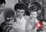 Image of dwarf family and babies Austin Texas USA, 1950, second 58 stock footage video 65675038031