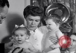 Image of dwarf family and babies Austin Texas USA, 1950, second 61 stock footage video 65675038031