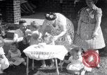 Image of first birthday of Nancy Gayle born to dwarf parents Austin Texas USA, 1950, second 1 stock footage video 65675038032