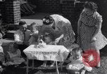 Image of first birthday of Nancy Gayle born to dwarf parents Austin Texas USA, 1950, second 4 stock footage video 65675038032
