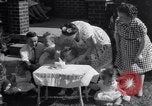 Image of first birthday of Nancy Gayle born to dwarf parents Austin Texas USA, 1950, second 5 stock footage video 65675038032