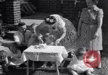 Image of first birthday of Nancy Gayle born to dwarf parents Austin Texas USA, 1950, second 7 stock footage video 65675038032