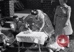 Image of first birthday of Nancy Gayle born to dwarf parents Austin Texas USA, 1950, second 8 stock footage video 65675038032