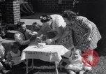 Image of first birthday of Nancy Gayle born to dwarf parents Austin Texas USA, 1950, second 12 stock footage video 65675038032