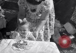 Image of first birthday of Nancy Gayle born to dwarf parents Austin Texas USA, 1950, second 21 stock footage video 65675038032