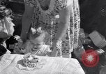 Image of first birthday of Nancy Gayle born to dwarf parents Austin Texas USA, 1950, second 24 stock footage video 65675038032