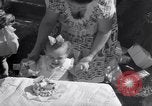 Image of first birthday of Nancy Gayle born to dwarf parents Austin Texas USA, 1950, second 25 stock footage video 65675038032