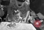 Image of first birthday of Nancy Gayle born to dwarf parents Austin Texas USA, 1950, second 27 stock footage video 65675038032