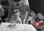 Image of first birthday of Nancy Gayle born to dwarf parents Austin Texas USA, 1950, second 28 stock footage video 65675038032