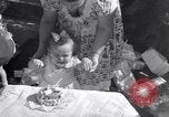 Image of first birthday of Nancy Gayle born to dwarf parents Austin Texas USA, 1950, second 30 stock footage video 65675038032