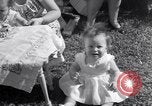 Image of first birthday of Nancy Gayle born to dwarf parents Austin Texas USA, 1950, second 42 stock footage video 65675038032
