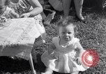 Image of first birthday of Nancy Gayle born to dwarf parents Austin Texas USA, 1950, second 43 stock footage video 65675038032
