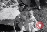 Image of first birthday of Nancy Gayle born to dwarf parents Austin Texas USA, 1950, second 44 stock footage video 65675038032