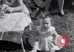 Image of first birthday of Nancy Gayle born to dwarf parents Austin Texas USA, 1950, second 45 stock footage video 65675038032