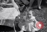 Image of first birthday of Nancy Gayle born to dwarf parents Austin Texas USA, 1950, second 46 stock footage video 65675038032