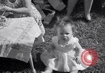 Image of first birthday of Nancy Gayle born to dwarf parents Austin Texas USA, 1950, second 47 stock footage video 65675038032