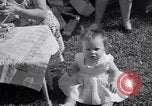Image of first birthday of Nancy Gayle born to dwarf parents Austin Texas USA, 1950, second 48 stock footage video 65675038032