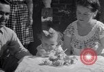 Image of first birthday of Nancy Gayle born to dwarf parents Austin Texas USA, 1950, second 50 stock footage video 65675038032
