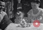 Image of first birthday of Nancy Gayle born to dwarf parents Austin Texas USA, 1950, second 52 stock footage video 65675038032
