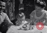 Image of first birthday of Nancy Gayle born to dwarf parents Austin Texas USA, 1950, second 53 stock footage video 65675038032