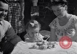 Image of first birthday of Nancy Gayle born to dwarf parents Austin Texas USA, 1950, second 55 stock footage video 65675038032