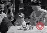 Image of first birthday of Nancy Gayle born to dwarf parents Austin Texas USA, 1950, second 58 stock footage video 65675038032